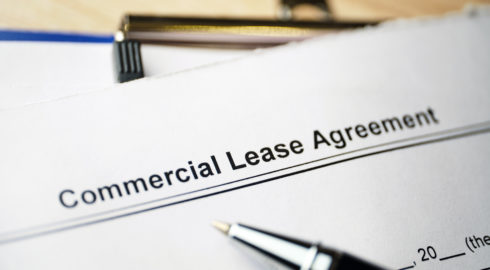 Legal document Commercial Lease Agreement on paper.